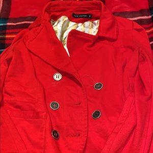 Red blazer with gold and white interior